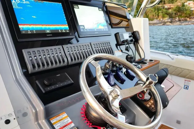 Slide: The Image of 2024 Victory V400 Open Sea boat dashboard with advanced navigation and control systems. - 3