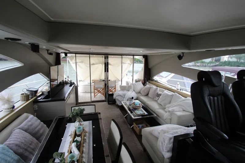 Slide: The Image of Luxurious interior of 2007 Uniesse 70 Sport yacht with modern seating and decor. - 17