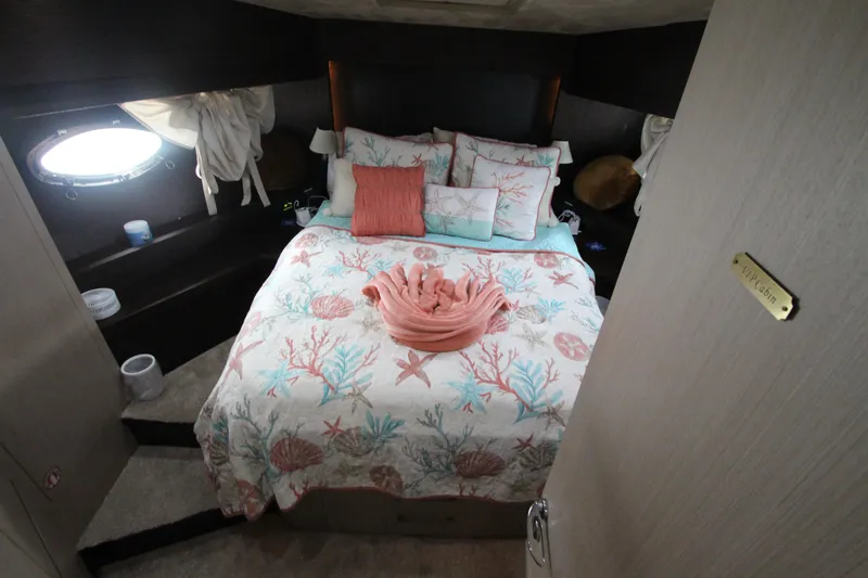 Slide: The Image of Luxurious bedroom in 2007 Uniesse 70 Sport yacht with nautical-themed bedding. - 30