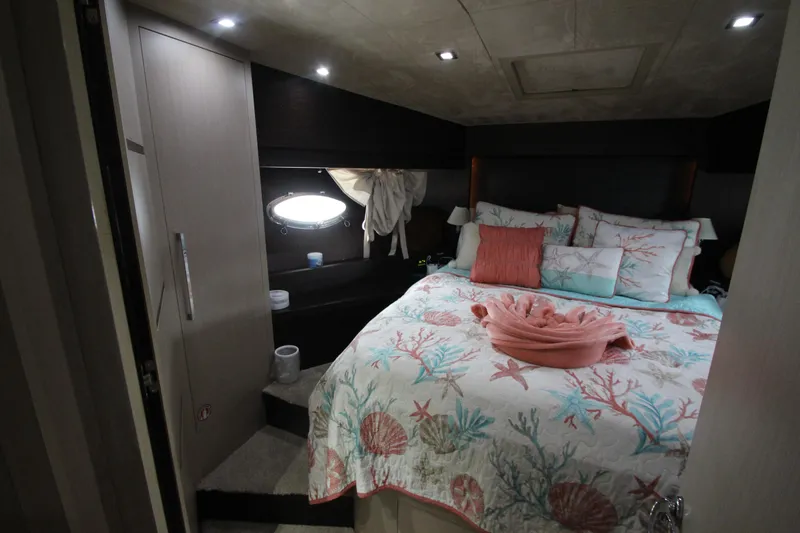 Slide: The Image of Luxurious bedroom in 2007 Uniesse 70 Sport yacht with ocean-themed bedding. - 36