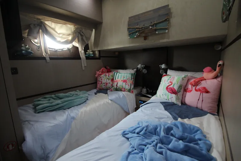 Slide: The Image of Cozy twin bedroom in 2007 Uniesse 70 Sport yacht with nautical decor. - 43