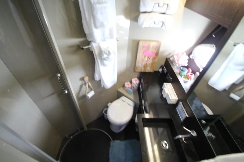 Slide: The Image of Luxurious bathroom in 2007 Uniesse 70 Sport yacht with modern amenities. - 47