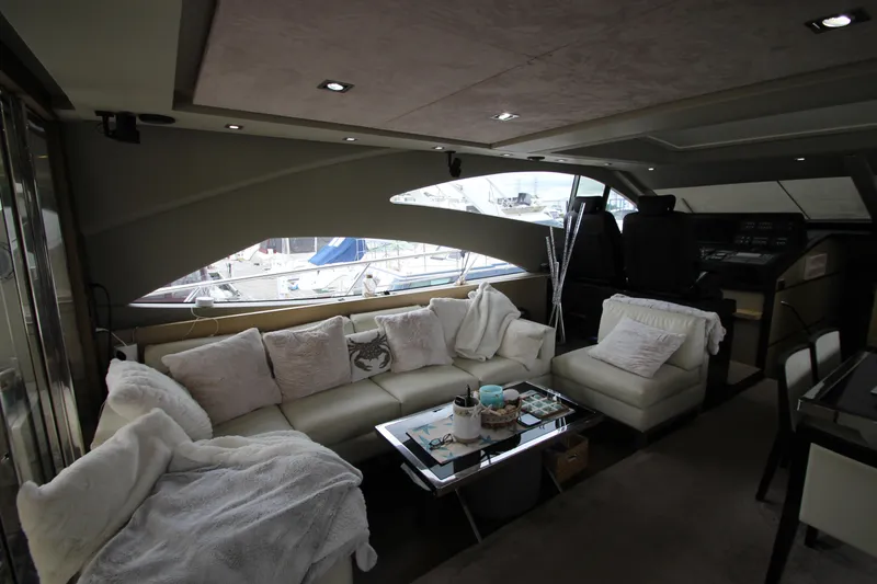 Slide: The Image of Luxurious interior of 2007 Uniesse 70 Sport yacht with plush seating and modern design. - 8