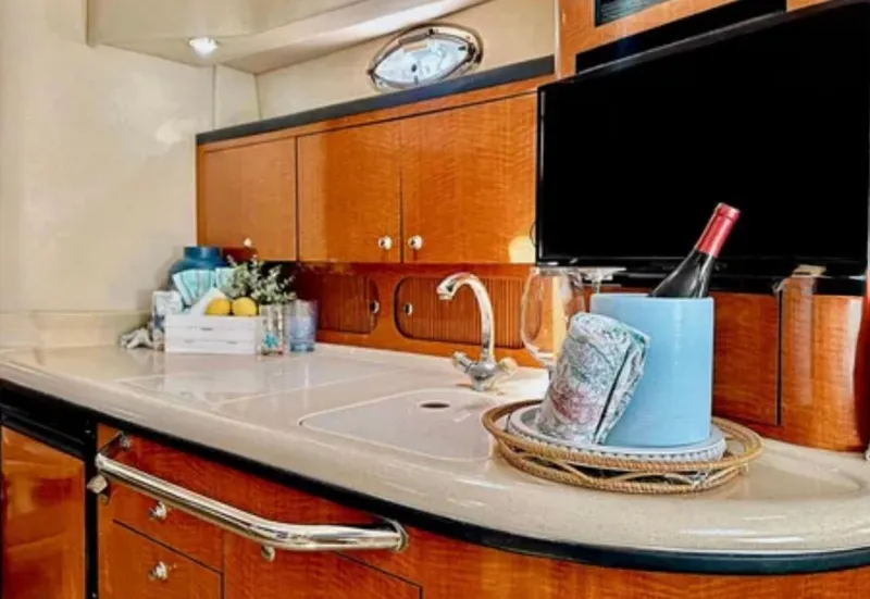 Slide: The Image of Dashboard of 2004 Sea Ray 340 Sundancer with Garmin navigation system. - 14