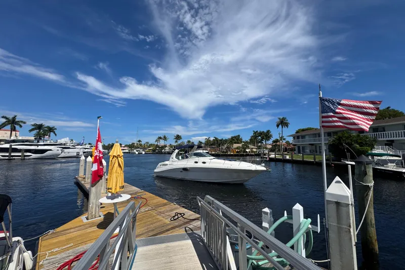 Slide: The Image of Luxurious interior of 2004 Sea Ray 340 Sundancer yacht with elegant decor and seating. - 21