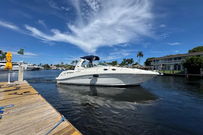 Slide: The Image of Luxurious bathroom interior of 2004 Sea Ray 340 Sundancer yacht with sink and storage. - 29