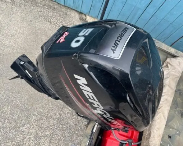 Slide: The Image of 2018 Tracker Grizzly 1648 SC with Mercury 50 HP outboard motor. - 16