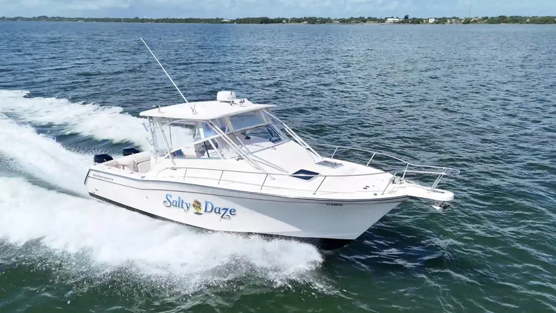 The Image of 2007 Grady-White Express 330 boat cruising on open water, named "Salty Daze". - 0