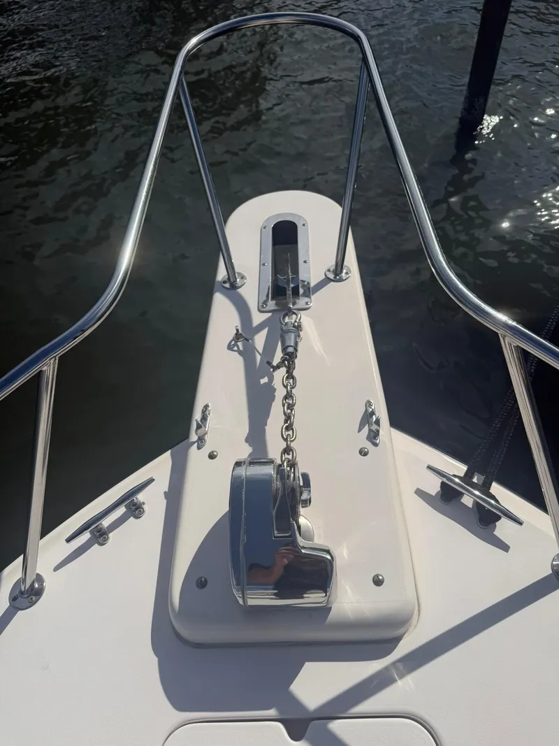 Slide: The Image of Bow of 2007 Grady-White Express 330 with anchor chain and railing. - 14