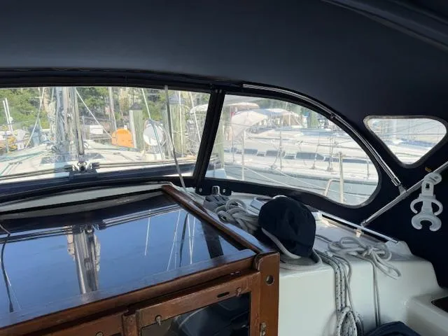 Slide: The Image of Cabin view of 2003 Caliber 40 LRC SE sailboat with ropes and wooden hatch. - 18