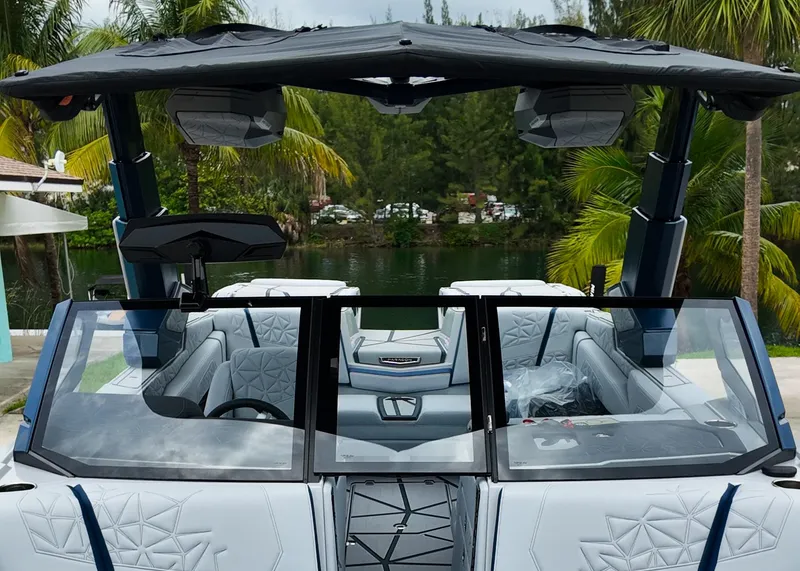 Slide: The Image of 2025 Nautique G23 Paragon boat interior with luxury seating and advanced features. - 21