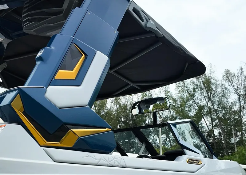 Slide: The Image of 2025 Nautique G23 Paragon boat with sleek design and modern features, set against a natural backdrop. - 3