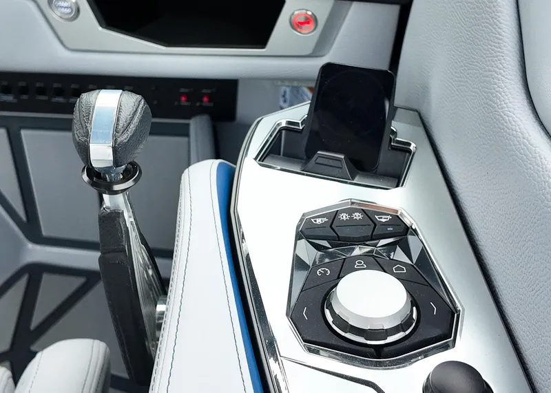 Slide: The Image of 2025 Nautique G23 Paragon control panel with sleek design and advanced features. - 4