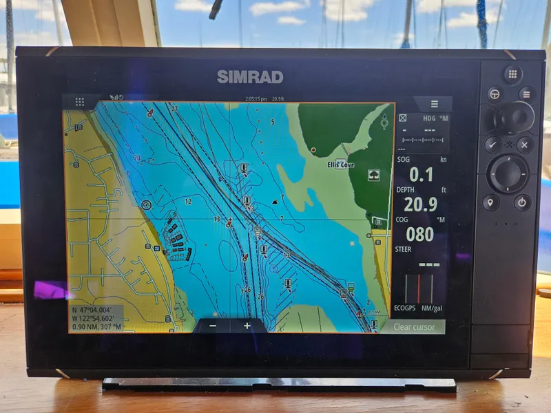 Slide: The Image of Simrad navigation display on 1973 Grand Banks 36 Classic, showing nautical chart and vessel data. - 17