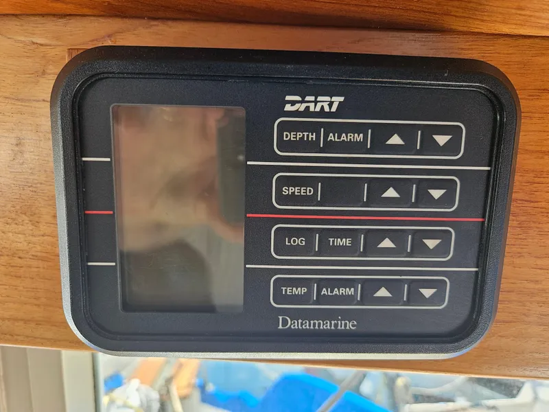 Slide: The Image of Datamarine instrument panel on 1973 Grand Banks 36 Classic, displaying depth, speed, and temperature. - 21