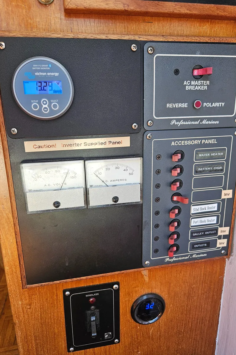 Slide: The Image of Electrical control panel on a 1973 Grand Banks 36 Classic boat. - 25