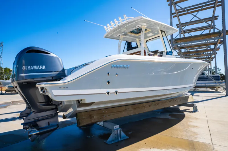 Slide: The Image of 2021 Pursuit S 288 Sport boat with Yamaha engine on display. - 16