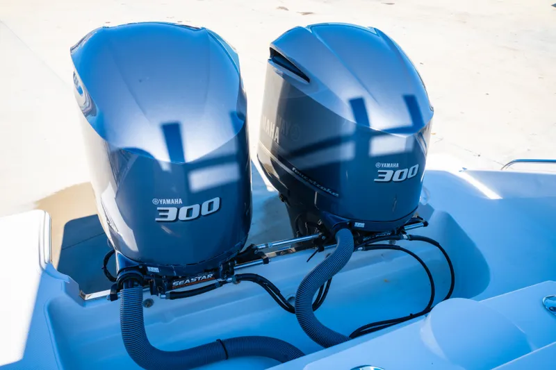 Slide: The Image of Twin Yamaha 300 engines on a 2021 Pursuit S 288 Sport boat. - 42