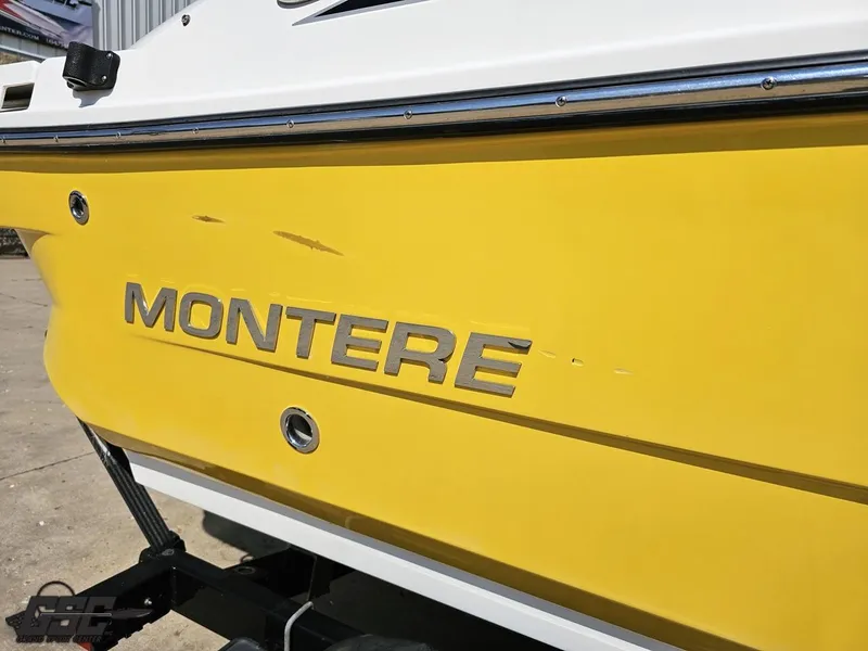 Slide: The Image of Yellow 2015 Monterey 196MFS boat with visible scratches on the side. - 10