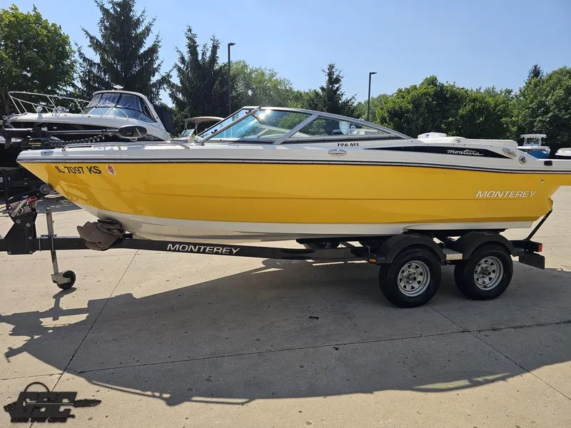 Slide: The Image of Yellow 2015 Monterey 196MFS boat on trailer, parked outdoors. - 25