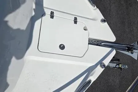 Slide: The Image of 2026 Parker 2220 Sport Cabin boat deck with anchor storage compartment. - 11