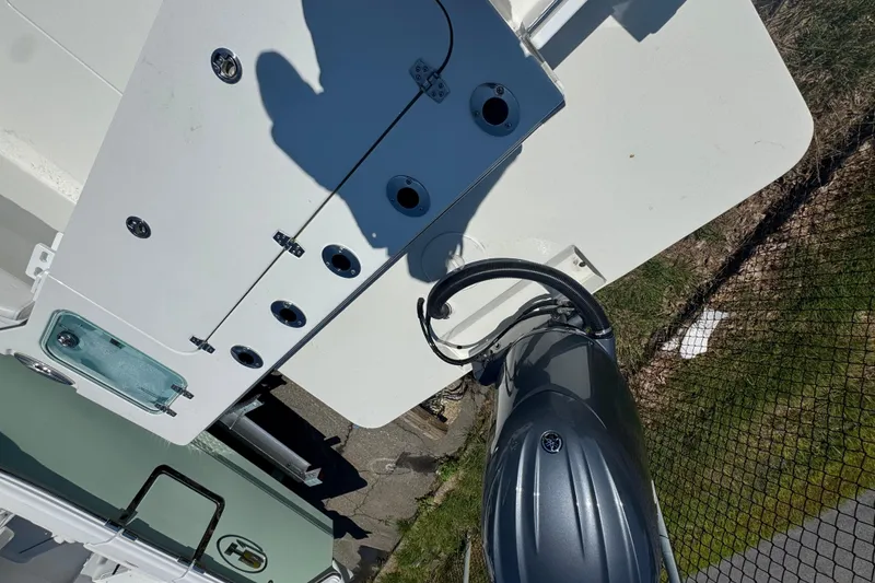 Slide: The Image of Overhead view of a 2025 Parker 2220 SC boat with outboard motor. - 7