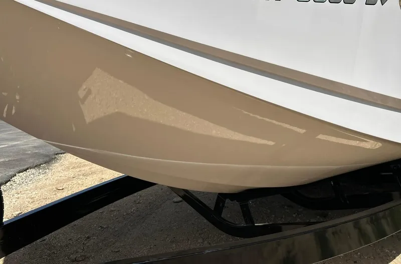 Slide: The Image of 2014 Nautique Super Air Nautique G23 boat hull on trailer. - 19