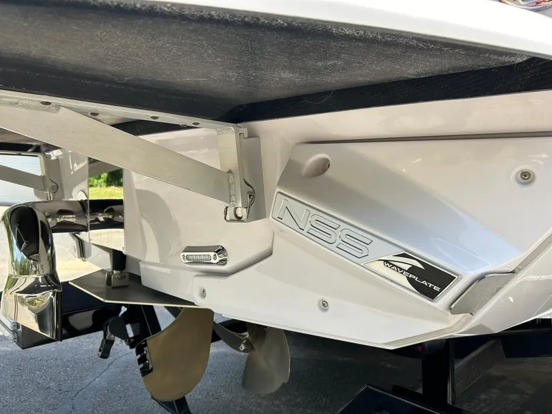 Slide: The Image of 2014 Nautique Super Air Nautique G23 boat with NSS waveplate detail. - 23