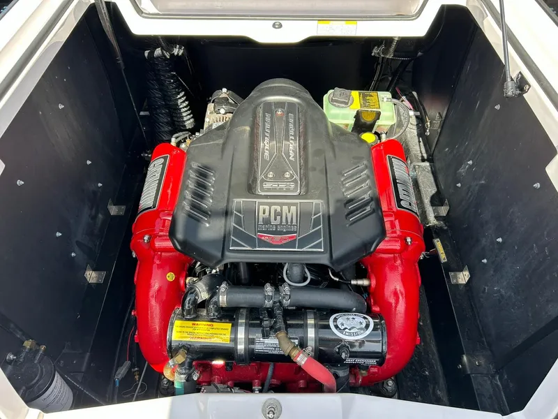 Slide: The Image of 2014 Nautique Super Air Nautique G23 engine compartment with PGM engine. - 37