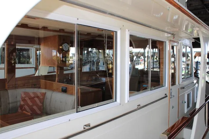 Slide: The Image of 1990 Grand Banks 36 Europa yacht with elegant interior and large windows. - 10