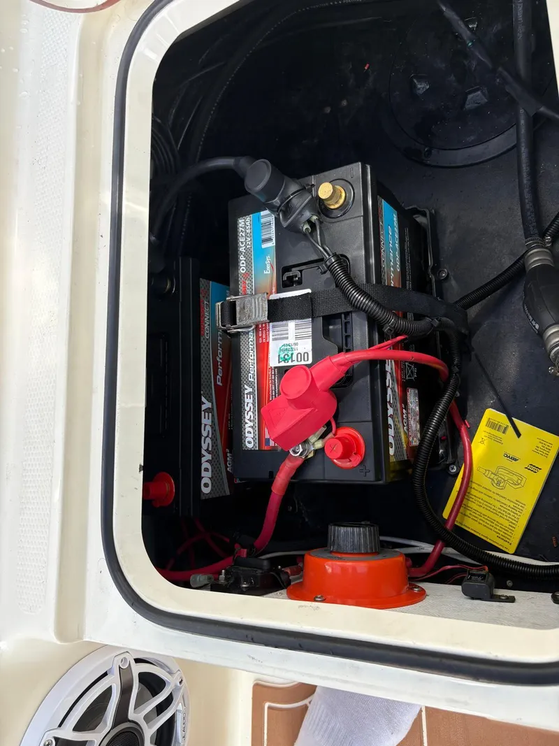 Slide: The Image of Battery compartment of a 2019 BlackJack 224 boat with Odyssey batteries and wiring. - 8