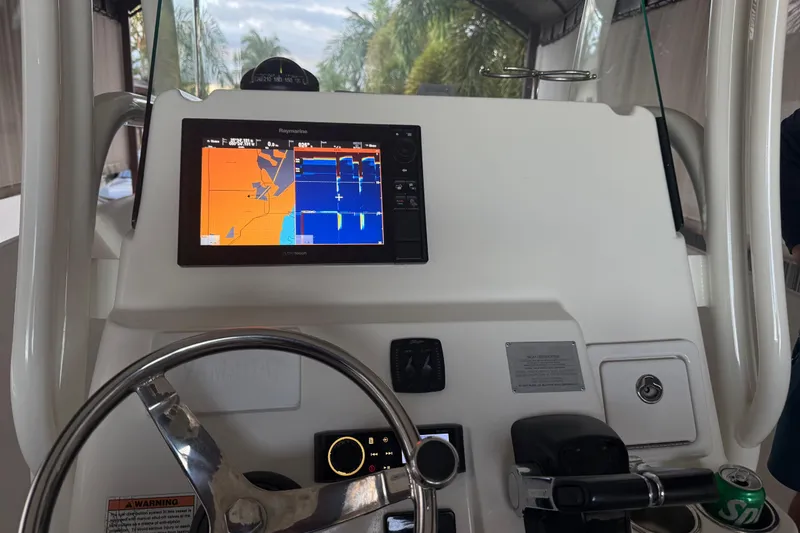 Slide: The Image of Century 2600 Center Console 2017 dashboard with steering wheel and navigation controls. - 11