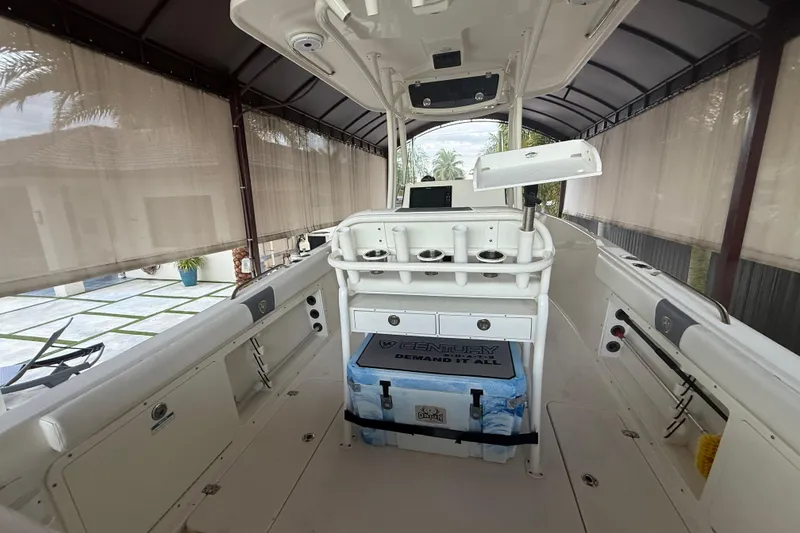 Slide: The Image of 2017 Century 2600 Center Console boat interior with seating and console view. - 16