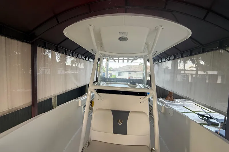 Slide: The Image of 2017 Century 2600 Center Console boat interior with cushioned seating. - 18