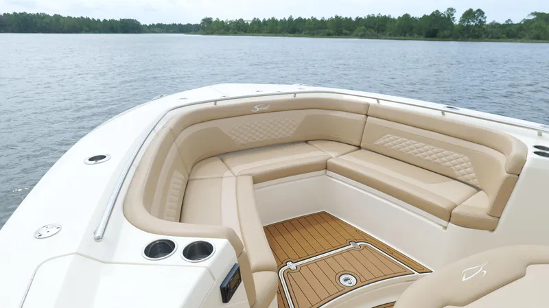 Slide: The Image of Luxurious seating on 2022 Scout 330 LXF boat with scenic water view. - 40