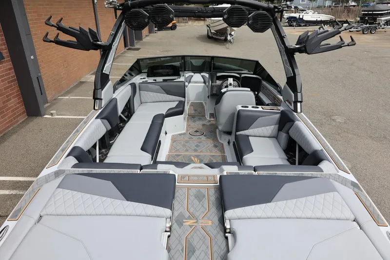 Slide: The Image of 2025 Tigé Z3 boat interior with luxurious seating and modern design. - 11