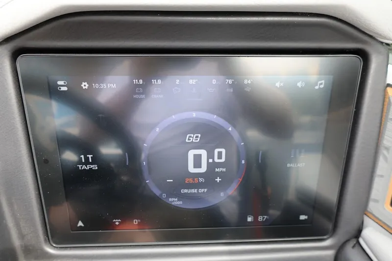 Slide: The Image of 2025 Tigé Z3 dashboard display showing speed, time, and settings. - 15