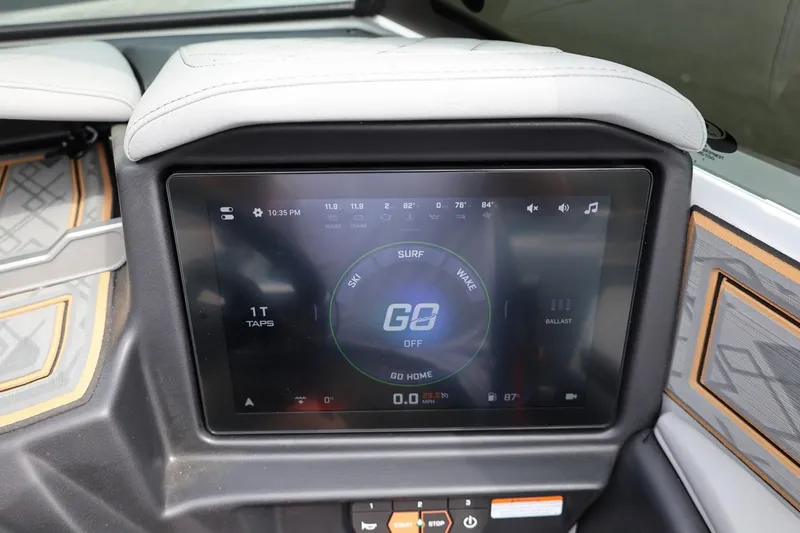 Slide: The Image of 2025 Tigé Z3 boat touchscreen display showing surf and wake settings. - 16