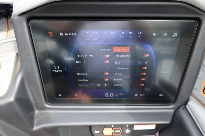 Slide: The Image of Touchscreen control panel in 2025 Tigé Z3 boat, displaying lighting and system settings. - 18