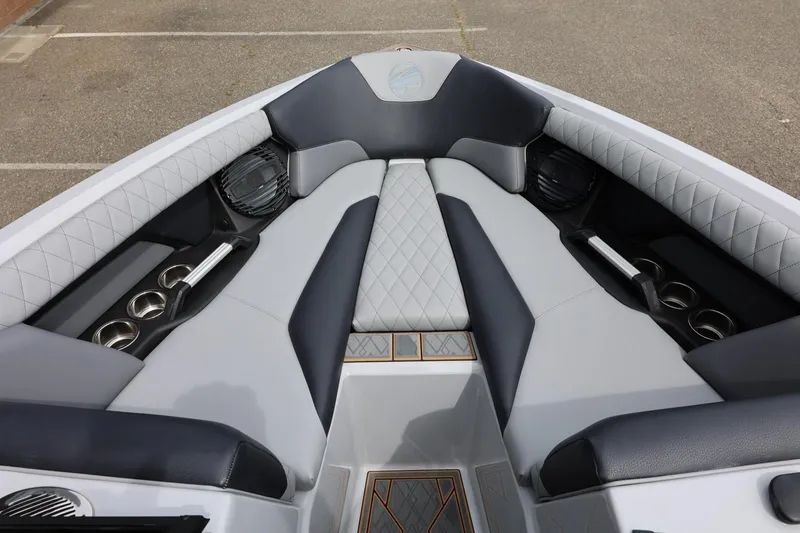 Slide: The Image of 2025 Tigé Z3 boat interior with luxurious seating and cup holders. - 23