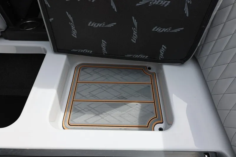 Slide: The Image of 2025 Tigé Z3 boat interior with custom flooring and branded upholstery. - 30