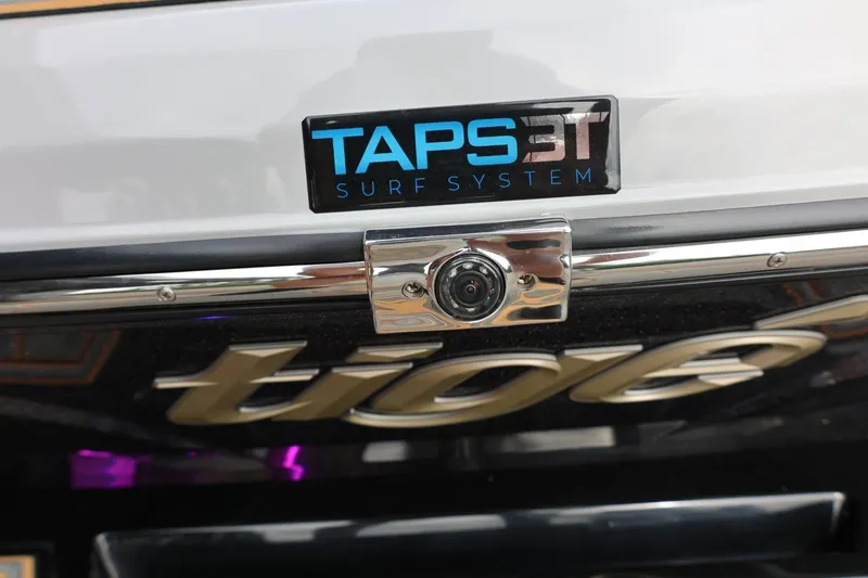 Slide: The Image of 2025 Tigé Z3 TAPS 3T Surf System badge with camera detail. - 44