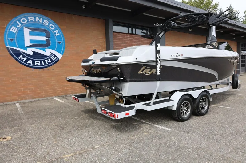 Slide: The Image of 2025 Tigé Z3 boat on trailer at Bjornson Marine dealership. - 9