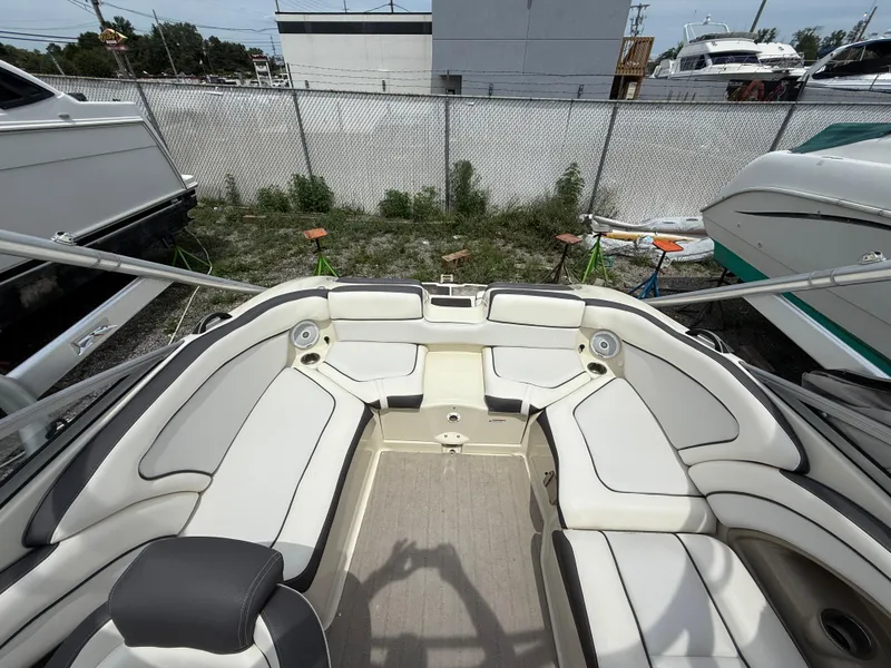 Slide: The Image of 2014 Yamaha Boats 242 Limited S interior with spacious seating and modern design. - 12
