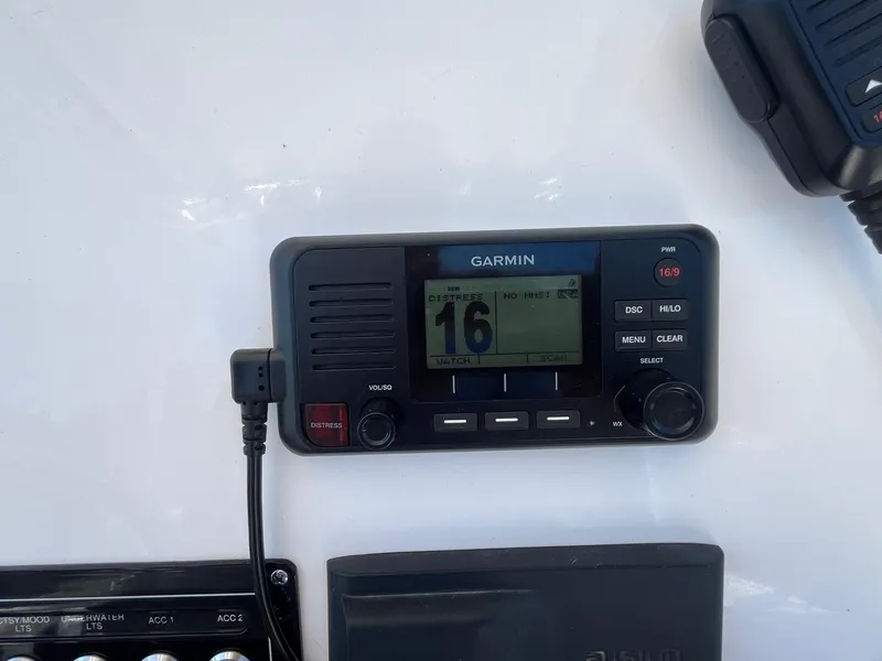 Slide: The Image of Garmin marine radio on 2023 Sea Fox 248 Commander boat dashboard. - 12