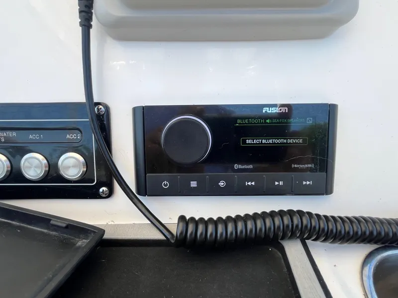 Slide: The Image of Fusion Bluetooth audio system on 2023 Sea Fox 248 Commander boat dashboard. - 13