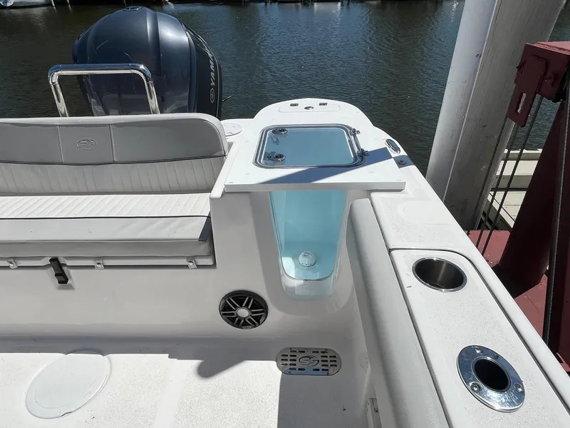 Slide: The Image of 2023 Sea Fox 248 Commander boat interior with seating, livewell, and cup holders. - 18