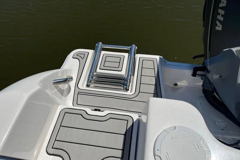 Slide: The Image of 2023 Sea Fox 248 Commander boat deck with ladder and Yamaha engine. - 20