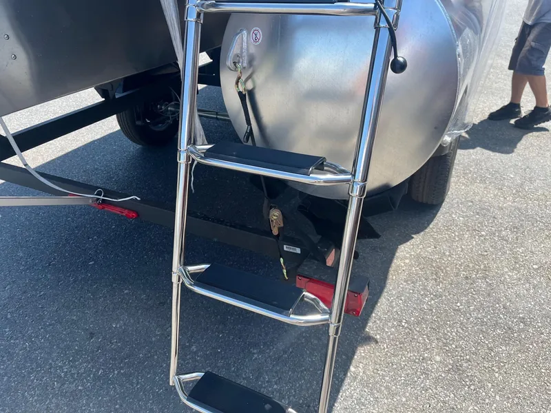 Slide: The Image of Ladder on a 2026 Sun Tracker Bass Buggy 18 DLX pontoon boat trailer. - 12