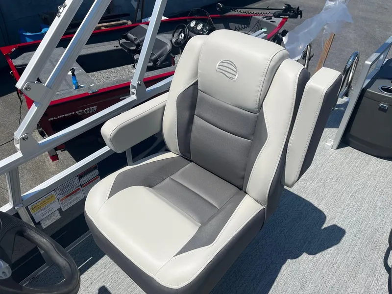 Slide: The Image of 2026 Sun Tracker Bass Buggy 18 DLX boat seat, featuring gray and white upholstery. - 9